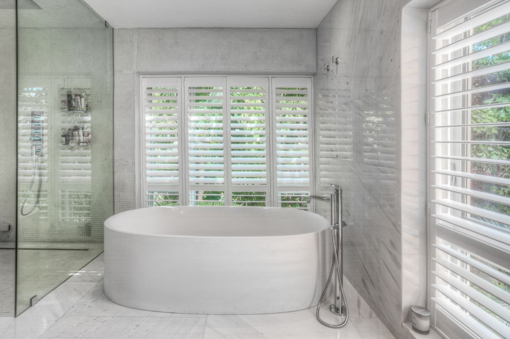 Residential bathroom with plantation shutters
