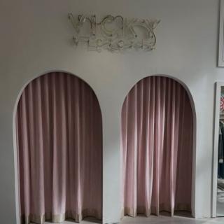 Drapery for fitting rooms at @shopvickyvictoria custom Gold hardware with pink linen fabric and a gold band to match the hardware. Just Lovely 🎀✨